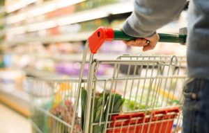 Close-up detail of a man shopping in a supermarket